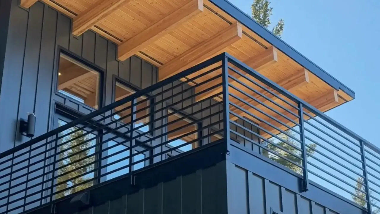 Infinity Topless frameless glass railing on a modern home exterior